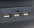 Подлокотник из экокожи с прострочкой с крышкой на кнопке, подстаканником и USB универсальный_26