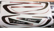Комплект виниловых наклеек на бока кузова (Иксы) и линию над порогом в стиле концепта Икс Рей Спорт для Лада Икс Рей