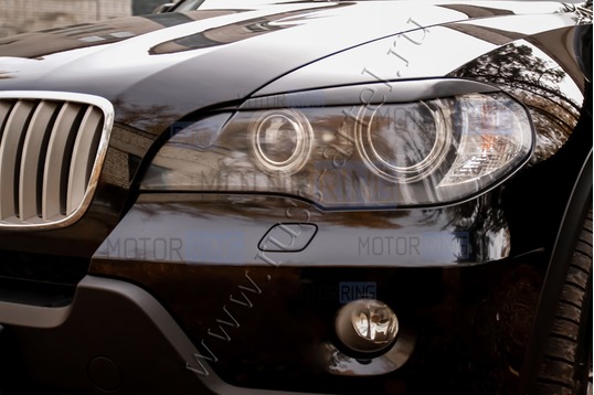 Реснички-накладки на передние фары под покраску для BMW X5 (E70) 2007-2010 г.в.