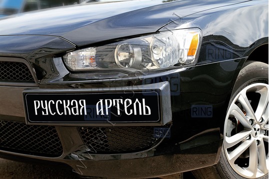 Накладка под номерной знак боковая Русская Артель для Mitsubishi Lancer X 2007-2010 г.в.