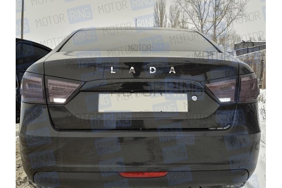 Черные светодиодные задние тюнинг фонари Тюн-Авто с бегающим поворотником для Лада Веста