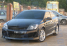 Передний бампер «DM STYLE» для Opel Astra