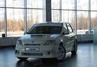 Передний бампер с решеткой «POWER DM» для Renault Logan