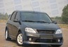 Передний бампер POWER DM фаза 2 неокрашенный для Renault Logan
